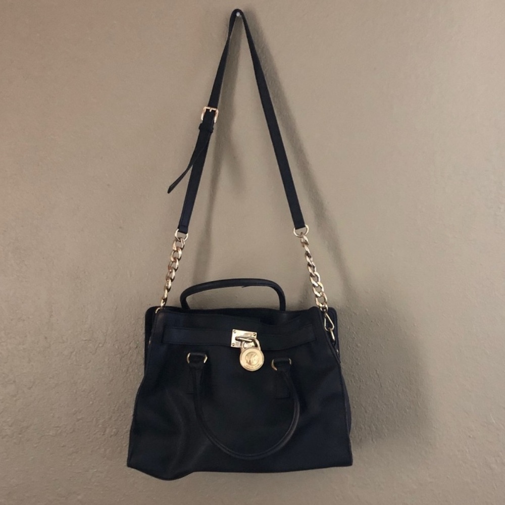 Michael Kors Elegant Black Handbag with Gold Accents